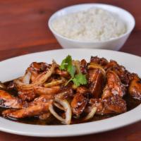 Hot & Spicy Chicken · Chicken with lemongrass and onions in chef’s special sauce.  Served with steam rice.  Specif...