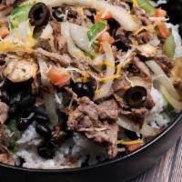 Steak Bowl · Signature steak on a bed of citrus-cilantro rice with your choice of toppings, dressings, an...