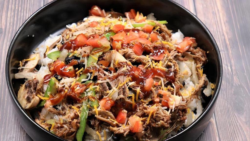 Pork Bowl · Pulled pork on a bed of citrus-cilantro rice and your choice of toppings, dressings, & sauces.