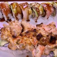 Godzilla Roll · Fried oyster and BBQ eel inside, tuna ,red snapper and avocado on top with eel sauce