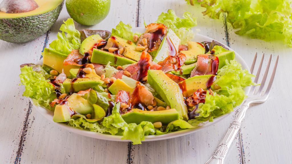Bacon & Avocado Salad  · Delectable salad full of lettuce, sliced tomatoes, red onions, avocado, bacon bits and creamy ranch sauce.
