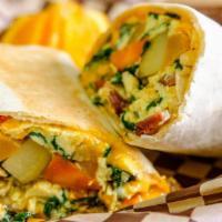 Veggie Burrito · Cheesy scrambled eggs tossed with fresh avocado, caramelized onions and spicy mayo. Wrapped ...