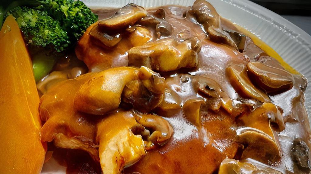 Chicken Marsala · Marsala wine and mushrooms and accompanied by mashed potatoes.