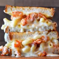 Lobster Mac Grilled Cheese · White cheddar mac and cheese topped with lobster claw meat, provolone and mozzarella cheese ...