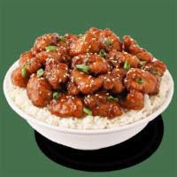 Sesame Chicken · Crispy chicken tossed with our bold and spicy sesame sauce and sesame seeds.