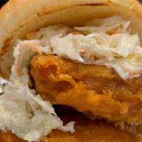 Fish ’Wich · Beer battered Atlantic cod, smothered in tartar sauce and topped with our house slaw. Served...
