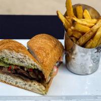 Steak 'Wich · Marinated skirt steak, provolone, roasted red peppers, and chimichurri on a toasted ciabatta...