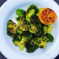 Roasted Broccoli · Broccoli tossed in garlic and lemon, charred to perfection.