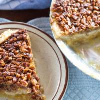 Pecan · Loads of buttery, caramelized pecan halves baked in a rich and heavenly filling.