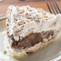Chocolate Pudding Nut · Layer of cream cheese mixture covered with pecans and chocolate filling, topped with whipped...