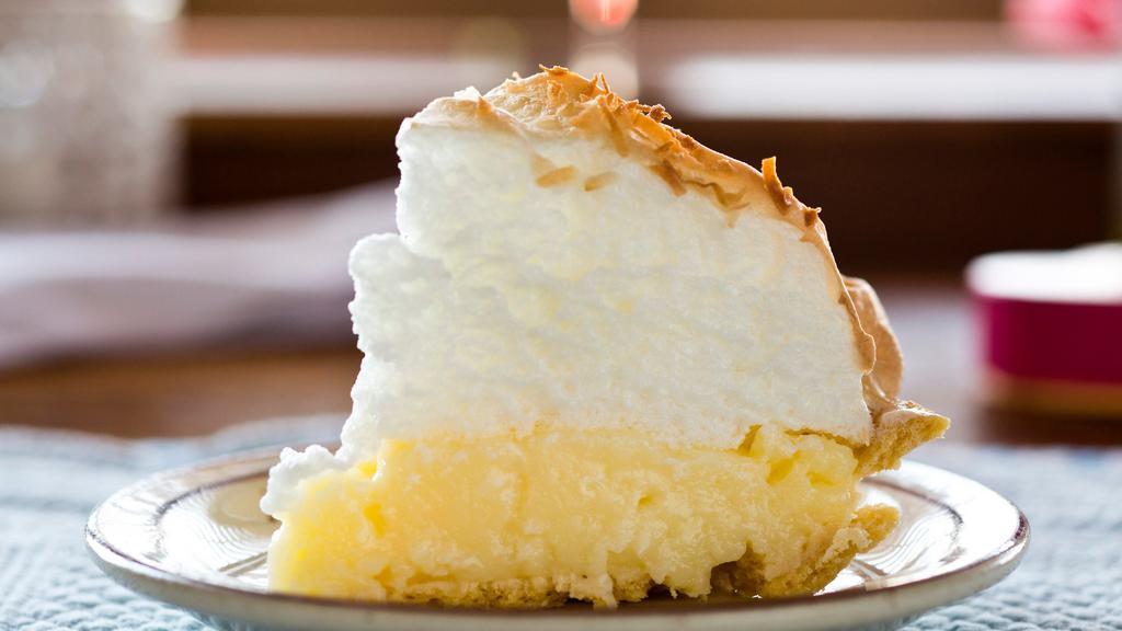 Coconut Meringue · Toasted coconut flakes are sprinkled over the meringue top which covers our creamy coconut filling.