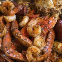  Small Kitchenz Big Seafood Boil Feast · King crab clusters, shrimp, beef sausage, cobb corn, boiled eggs, small kitchenz seasoned ho...
