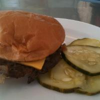 Cheeseburger · Grilled onions, mustard, ketchup, pickles.