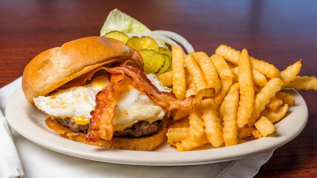 Bacon, Egg And Cheese Burger · A ½ pound handcrafted Angus beef burger, flame-broiled to perfection, topped with American cheese, a fried egg and crispy bacon, served on a grilled Brioche bun.