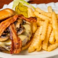The Big Marty Burger · A ½ pound handcrafted Angus beef burger, marinated in A-1 Steak Sauce, flame-broiled to perf...