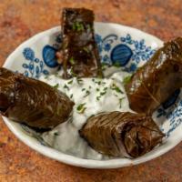 Dolme (Grape Leaf) (4 Pieces) · Grape Leafs Stuffed with ground beef and rice.