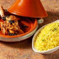 Prunes & Apricots Lamb Tagine · Lamb shank with prunes and apricots slow cooked in sweet saffron sauce topped with roasted a...