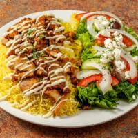 Chicken Shawarma Rice Platter · Popular. Marinated Chicken Shawarma Served  over Basmati Rice With Side Green Salad.