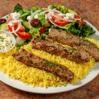 Chicken Kabob (2 Skewers) · New. Marinated Ground chicken breast  mixed with our house spices, Served  over Basmati Rice...