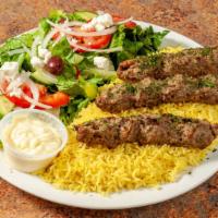 Moroccan Beef Kafta Plate (2 Pieces) · New. Ground beef mixed with our house spices Served  over Basmati Rice With Side Green Salad.