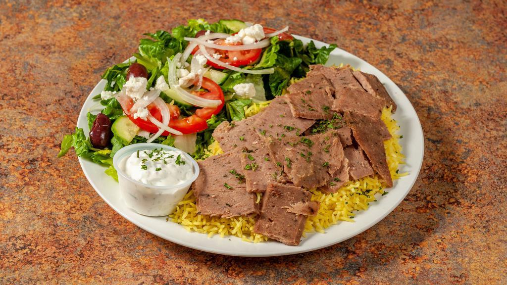 Beef Gyro Rice Platter · Beef gyro, Served  over Basmati Rice With Side Green Salad.