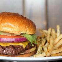Classic Burger · House ground beef, lettuce, tomato, onion, cheese, lemon aioli with a house pickle. Served w...