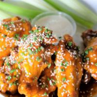 Mango Habanero Wings · sesame seeds and chives