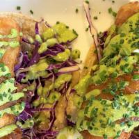 Fish Tacos · Beer battered cod, red cabbage, roasted jalapeno-cilantro aioli
