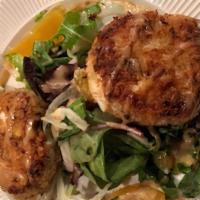 Jumbo Lump Maryland Crab Cakes  · Shaved fennel salad and honey chipotle sauce