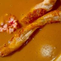 Lobster Bisque Soup  · Thick and creamy soup.