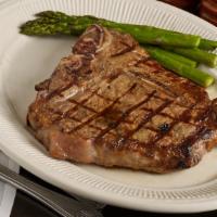 Black Angus Porterhouse Steak (24 Oz.) · Combines the tender filet mignon with the meaty-flavored new york strip. served with starch ...