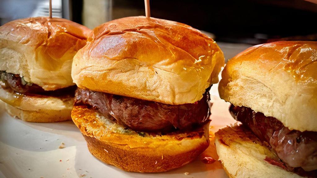 Filet Sliders (3) · Char-Grilled Filet Mignon Medallions on Mini Brioche Buns with Herb-GArlic Butter
