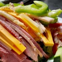Classic Chef’S Salad · Crisp, mixed greens topped with ham, turkey, American and swiss cheese, tomato, cucumber, gr...