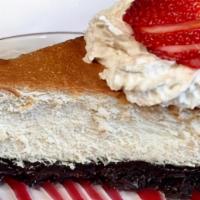 Y. Style Cheesecake · Thick oreo cookie crust rich and creamy cheesecake