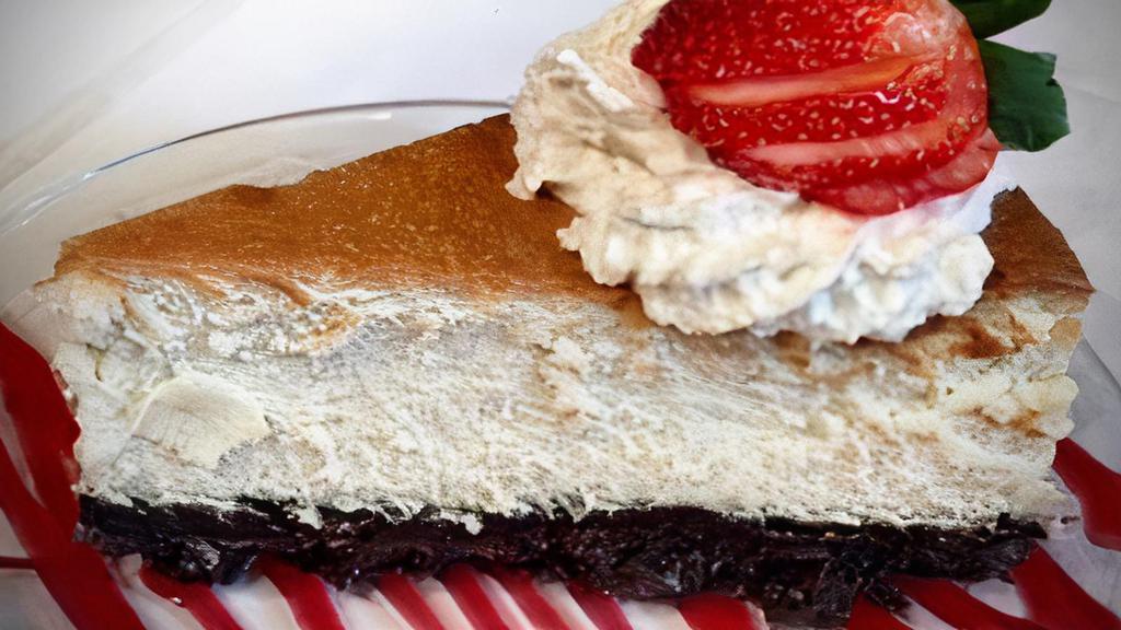 Y. Style Cheesecake · Thick oreo cookie crust rich and creamy cheesecake