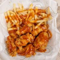 Chicken · Chicken comes in small party wing sections. Includes fries and a canned soda.