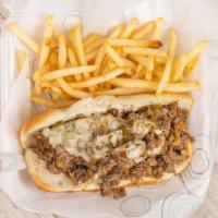 Philly Cheesesteak With Fries · Seasoned thin steak with bell pepper and onion, and provolone cheese served on a soft hoagie...