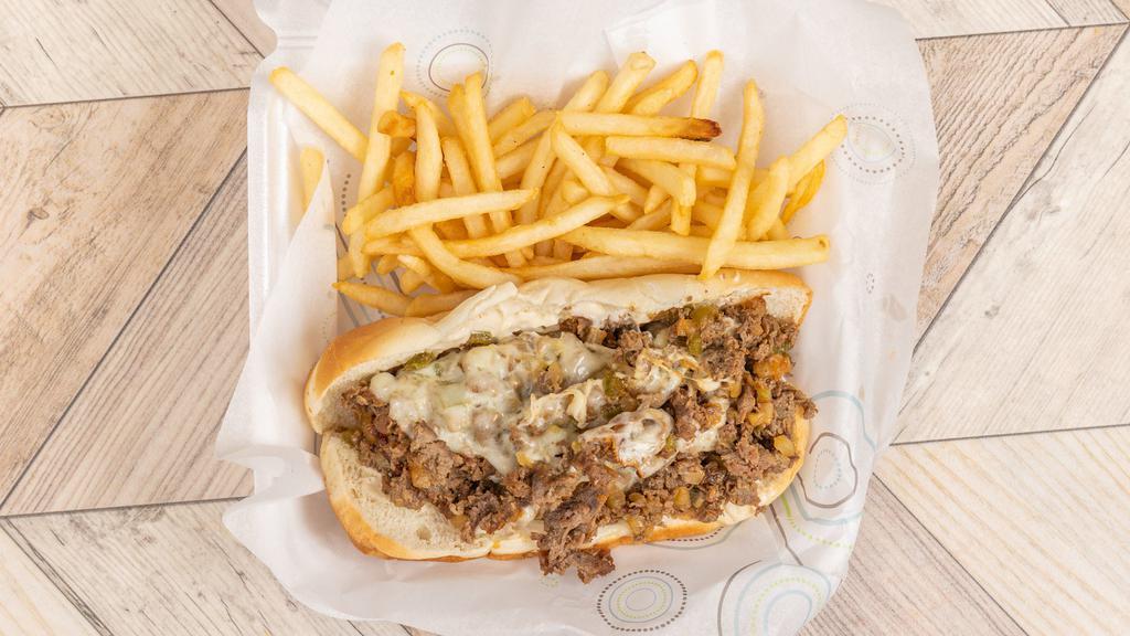 Philly Cheesesteak With Fries · Seasoned thin steak with bell pepper and onion, and provolone cheese served on a soft hoagie bun. Includes French fries.