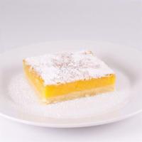 New! Lemon Bar · A sweet and tangy lemon bar on a buttery shortbread crust.