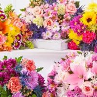Designer'S Choice Hand-Wrapped Bouquet - Mixed Flowers  · Our fresh market bouquets of showy, colorful blooms are created with a selection of splendid...
