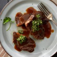 Braised Short Ribs · Irresistibly tender grass-fed beef short ribs, topped with pan sauce and fresh, homemade hor...