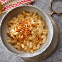 Gouda Mac & Cheese · Smoked Wisconsin gouda and American cheese sauce over elbow macaroni with house creole spice...