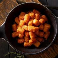 Savory Tots · Fried tater tots with house made Cajun spice mix