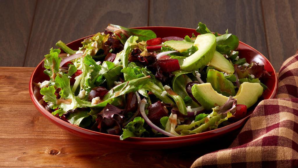 Side Chopped Salad · Salt roasted red beets, avocado, red onion, red grapes, chevre with mixed greens. Hand-made balsamic vinaigrette with thyme, oregano, and garlic.
