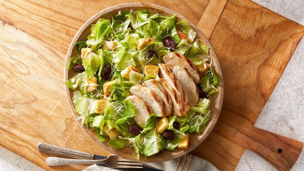 Grilled Buttermilk Chicken Caesar · House made buttermilk ranch marinated chicken breast, romaine hearts, Kalamata olives, garlic herb croutons and parmesan.  Caesar dressing with spicy Dijon, red wine vinegar, and fermented fish sauce.