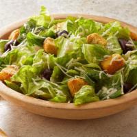 Side Caesar Salad · Romaine hearts, Kalamata olives, garlic herb croutons and parmesan.  Caesar dressing with sp...