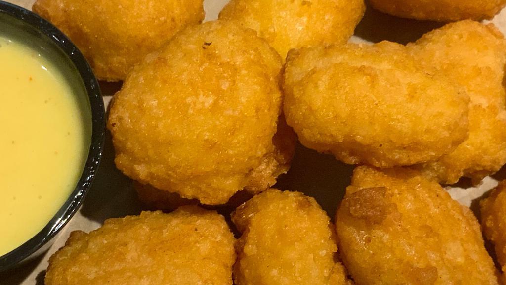 Sweet Corn Nuggets · Sweet creamed corn breaded and fried to golden brown. Served with honey mustard dressing.