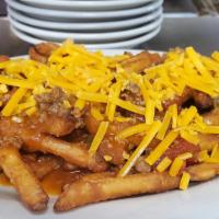 Chili Cheese Fries · A large order of fresh-cut fries covered with chili and shredded cheddar cheese.