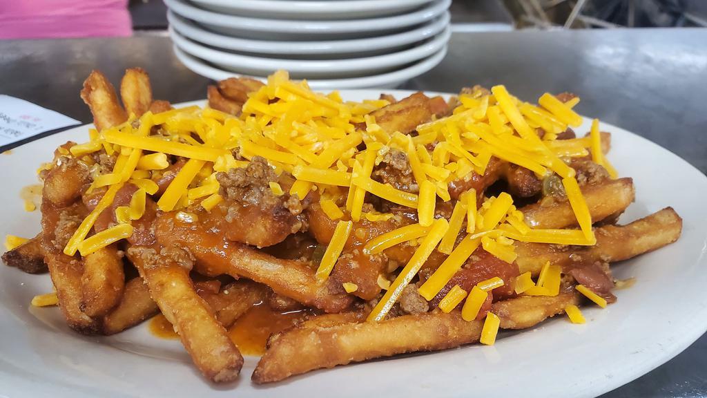 Chili Cheese Fries · A large order of fresh-cut fries covered with chili and shredded cheddar cheese.
