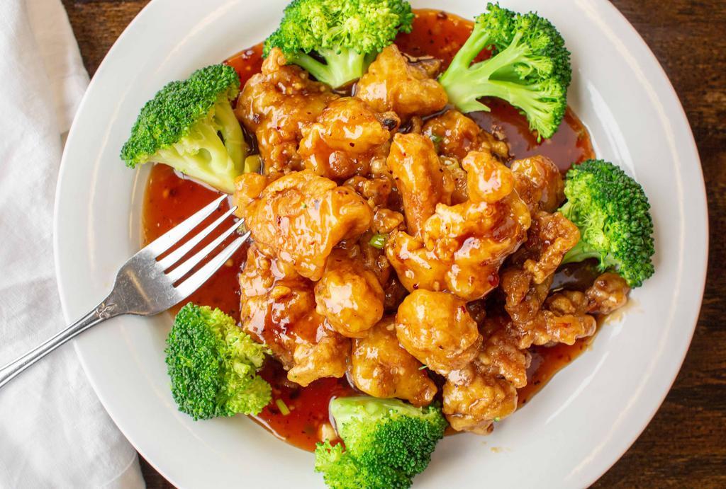 General Tso'S Chicken · Hot and spicy. Marinated chicken chunks deep fried & sauteed w/ chef's special hot pepper broccoli, garlic flavored tangy brown sauce.